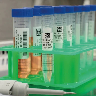 Laboratory sample tubes carrying printed barcode identification labels